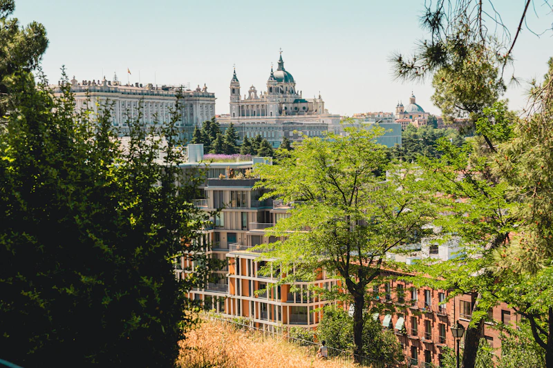 Cityscape with historic buildings and modern architecture.
