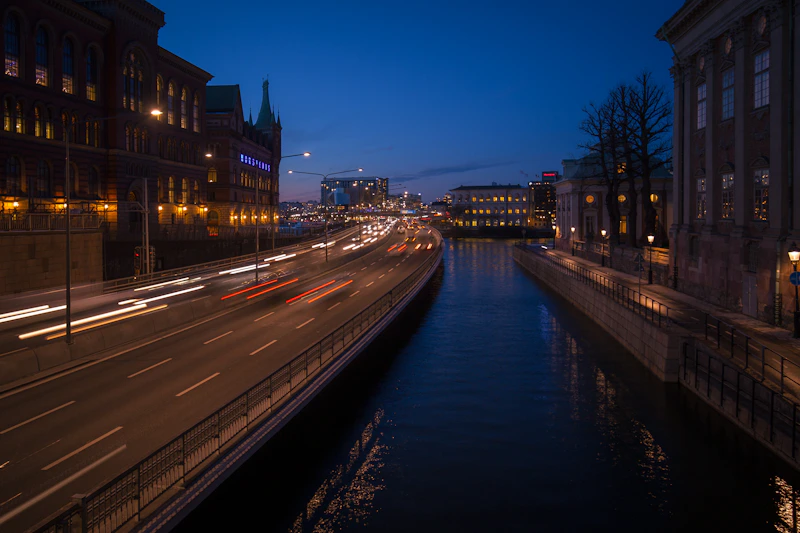 a river running through a city at night
